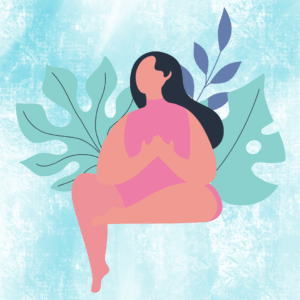 Kobieta siedząca wśród zieleni praktykująca uważność i współczucie.